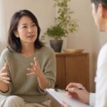 Woman in a consulting room talking with a doctor