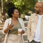A woman and her partner in conversation on an outdoor walk